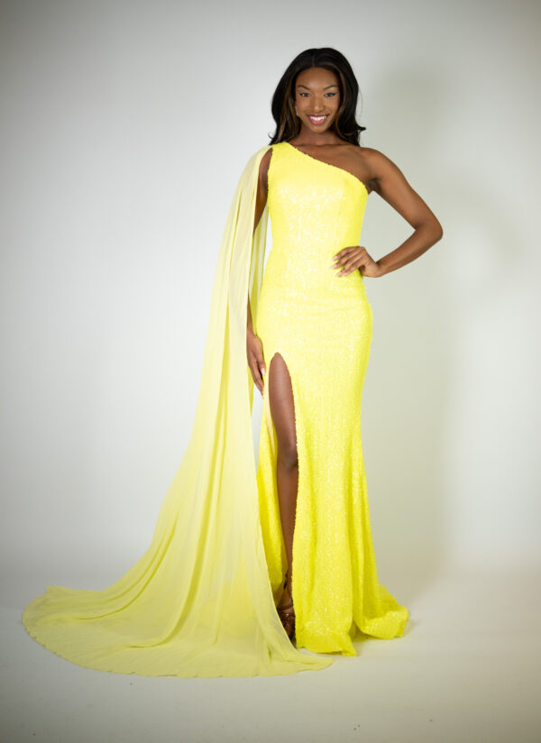 Alt text: "Rich neon yellow gown called Teshi, featuring a one-shoulder cape, high slit, full sequins, and a mid-length train, perfect for glamorous occasions."