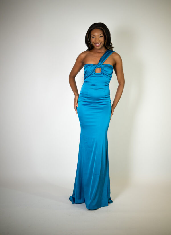 Alt text: "Dark teal satin gown called Glaceon, featuring a one-shoulder detail, perfect for special occasions."