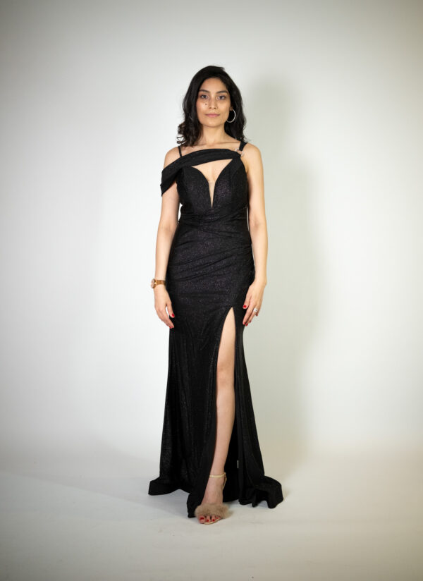 black sparkly satin gown called Lottie, featuring a sweetheart neckline, off-the-shoulder details, and a high slit, perfect for glamorous occasions."