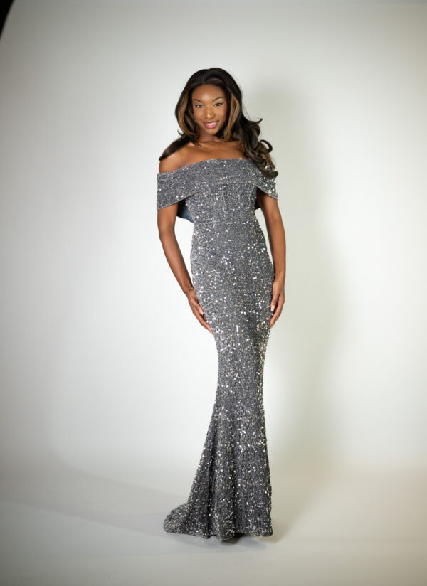 Alt text: "Silver off-the-shoulder sequin gown called Simmi, perfect for special occasions."