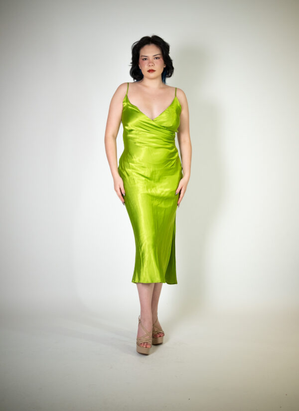 Alt text: "Lime green midi dress called Cosmo, featuring a V-neck, silk satin fabric, and adjustable straps, perfect for special occasions. Size fits: 4-6."