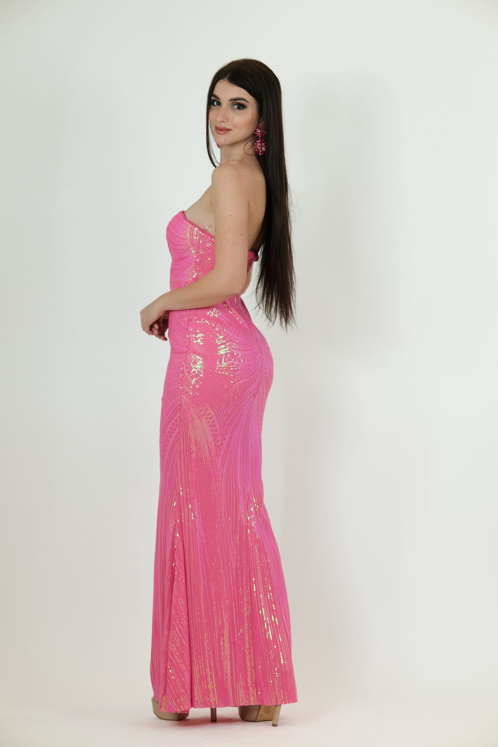 Bright pink strapless sequin evening gown called Aveline, featuring a fitted silhouette and floor-length design, perfect for special occasions
