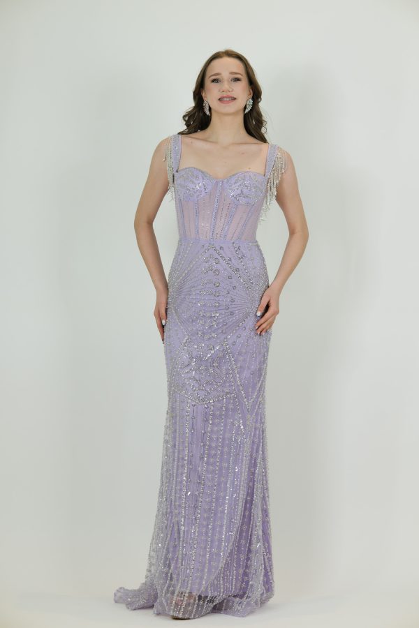 “Lilac beaded gown with structured corset bodice and crystal-draped straps.”