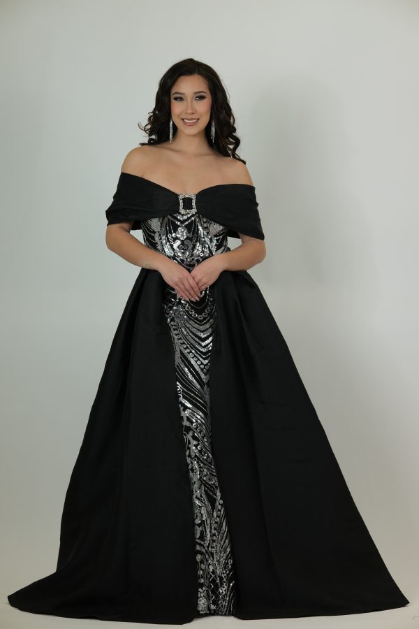 "Black off-the-shoulder ballgown with draped neckline, front-opening overskirt, and silver sequin patterned underlay."