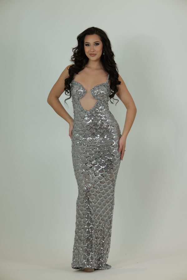 "Silver full-sequin fitted gown with scalloped beading, illusion mesh cutout, and sculpted sequin bodice."